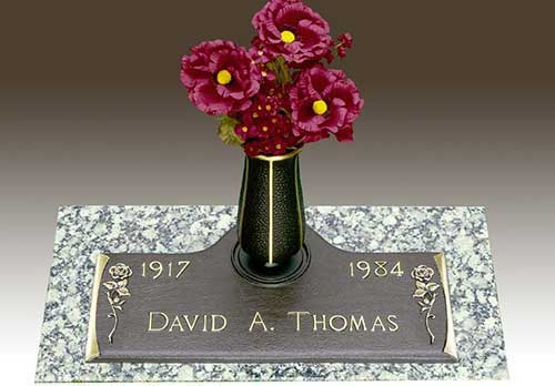 curved bronze memorial, curved around vase