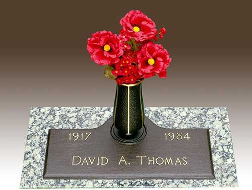 curved bronze memorial, curved around vase